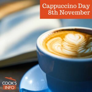 Cup of cappuccino with a book