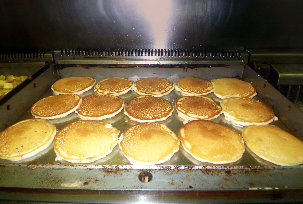 Pancakes on a diner griddle