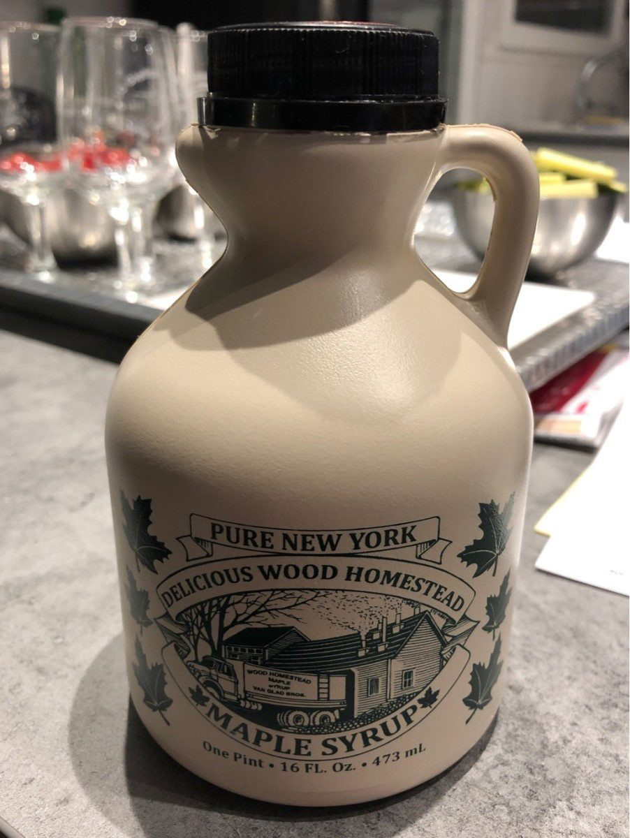 Beige plastic maple syrup jug with limited storage life