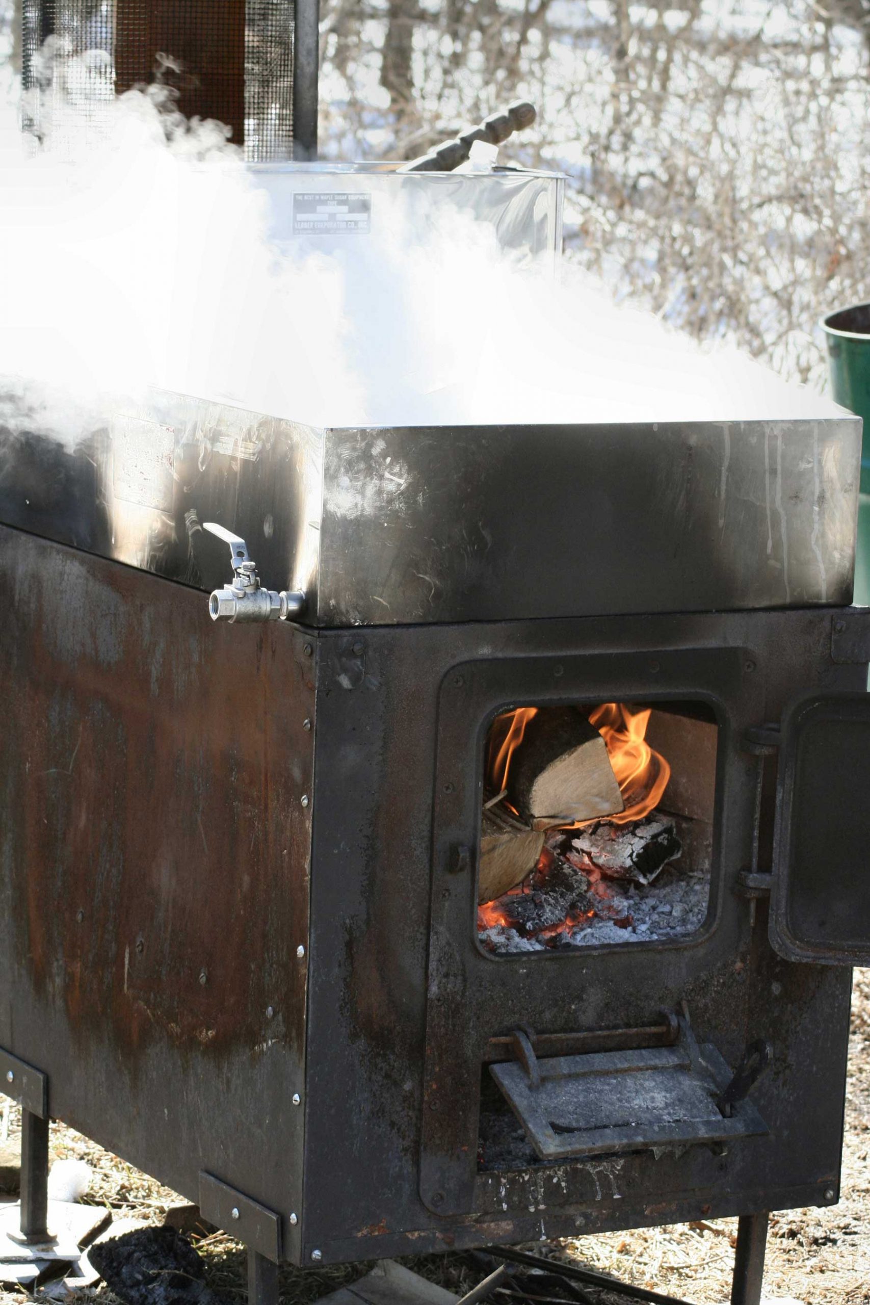 Boiling maple sap down into syrup